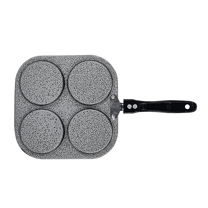 Four-sectioned frying pan with speckled surface and black handle on a white background