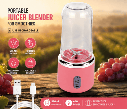 Pink portable juicer blender with features highlighted on a wooden surface with grapes in the background.